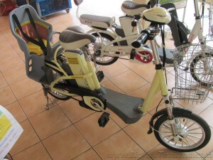 Electric bicycle with child carrier seat