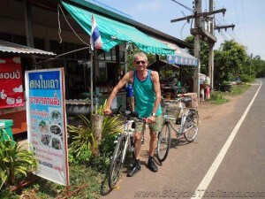 The author at a favourite breakfast stop, Mone's cafe at Ban Ta Tuat