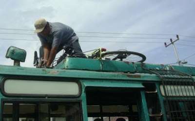 Bicycle on top of bus